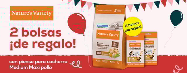 Nature's Variety: 2 bolsas de snacks de regalo con pienso Medium maxi pollo para cachorro